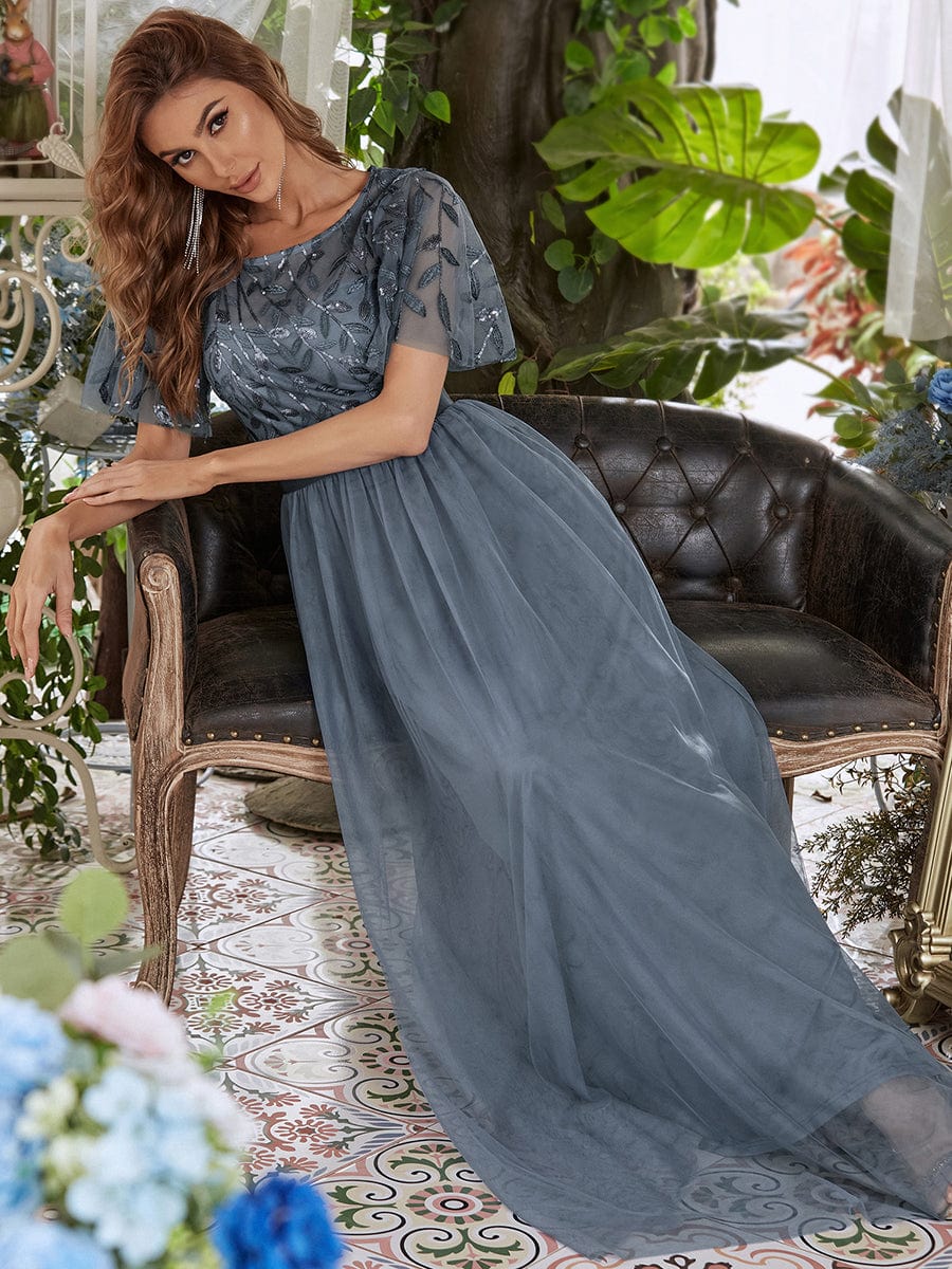 Glittering Sequin Evening Gown with Cap Sleeves and Waist Detail