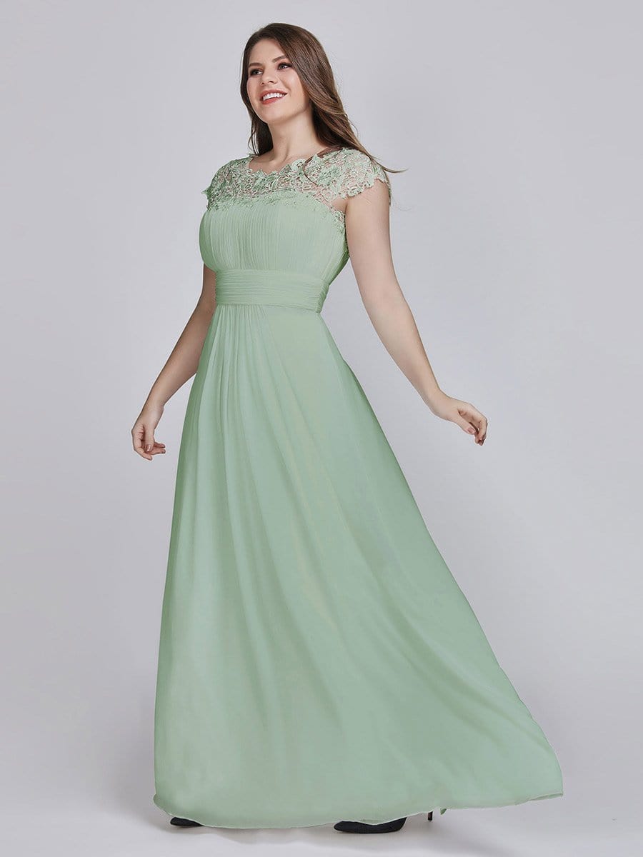 Elegant Lace Cap Sleeve Chiffon Evening Gown with Ruched Detail: Lacey Neckline Open Back Ruched Bust Plus Size Evening Dress