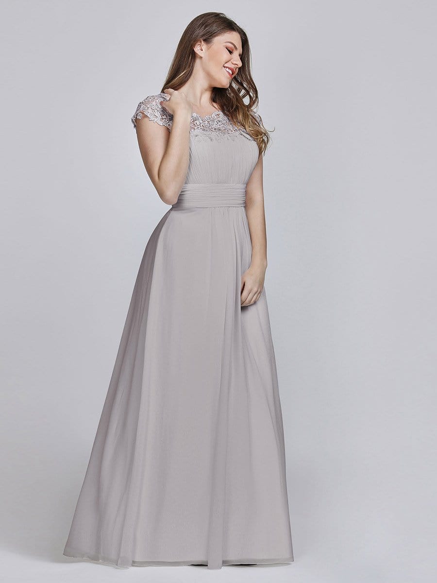 Elegant Lace Cap Sleeve Chiffon Evening Gown with Ruched Detail: Lacey Neckline Open Back Ruched Bust Plus Size Evening Dress