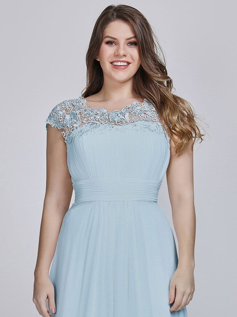 Elegant Lace Cap Sleeve Chiffon Evening Gown with Ruched Detail: Lacey Neckline Open Back Ruched Bust Plus Size Evening Dress