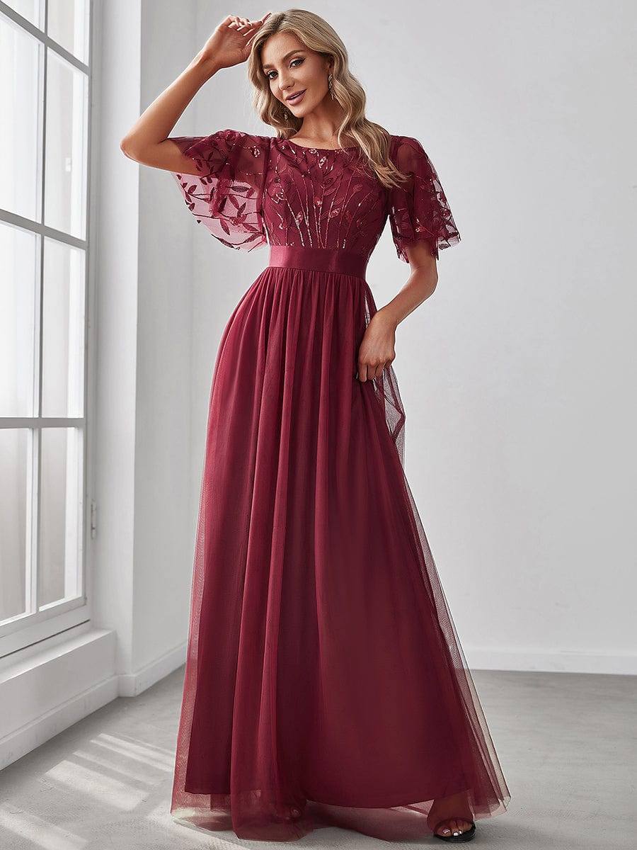 Glittering Sequin Evening Gown with Cap Sleeves and Waist Detail