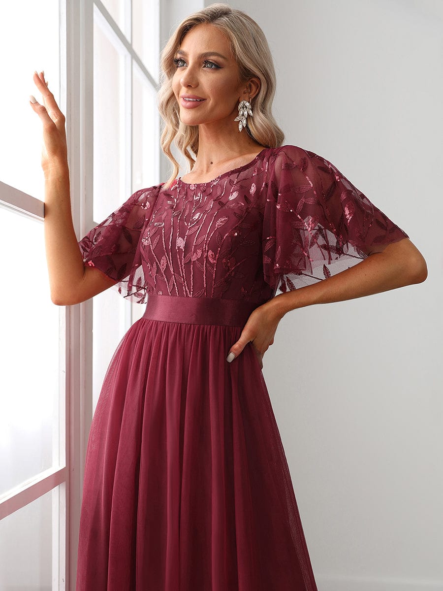 Glittering Sequin Evening Gown with Cap Sleeves and Waist Detail