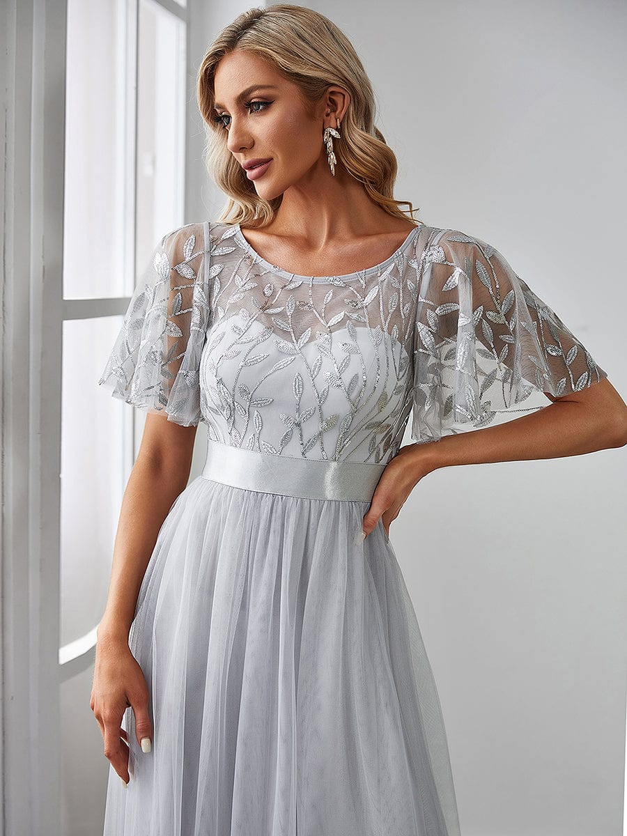 Glittering Sequin Evening Gown with Cap Sleeves and Waist Detail